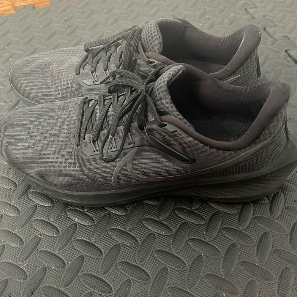 Black Nike running shoes